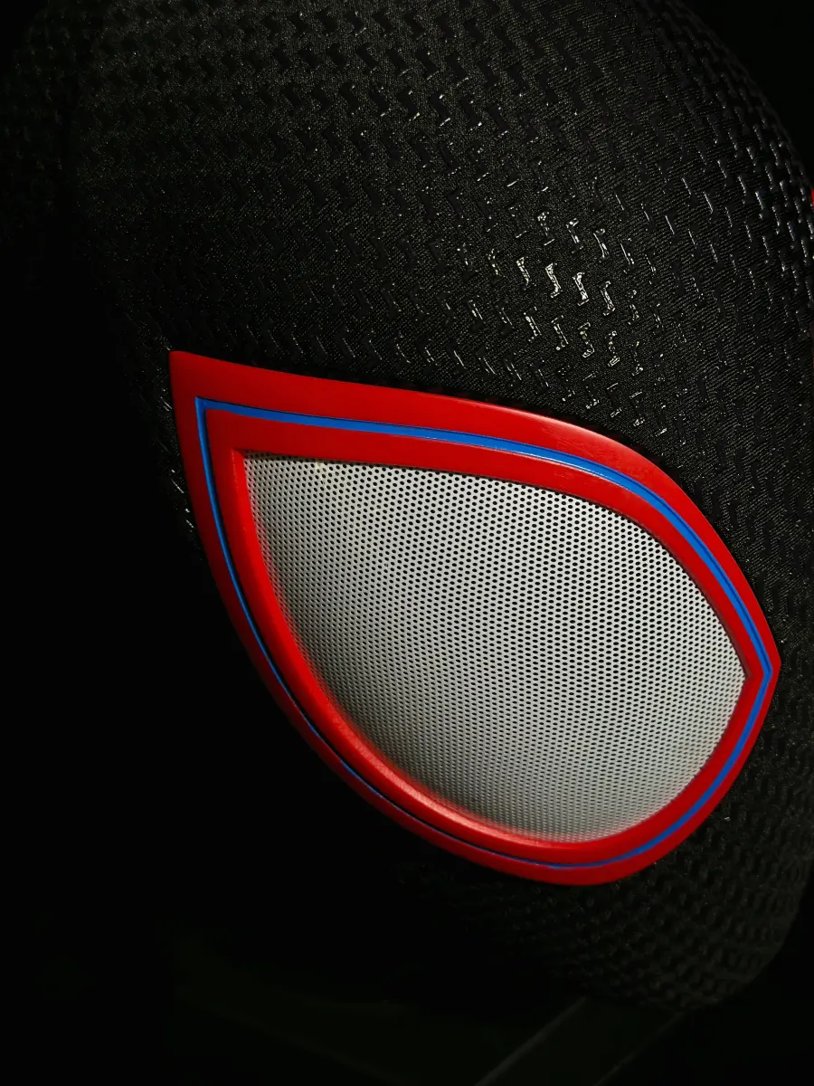 MaskOryx Miles Edition wearable cosplay mask featuring a black textured fabric and striking red and blue eye lenses.