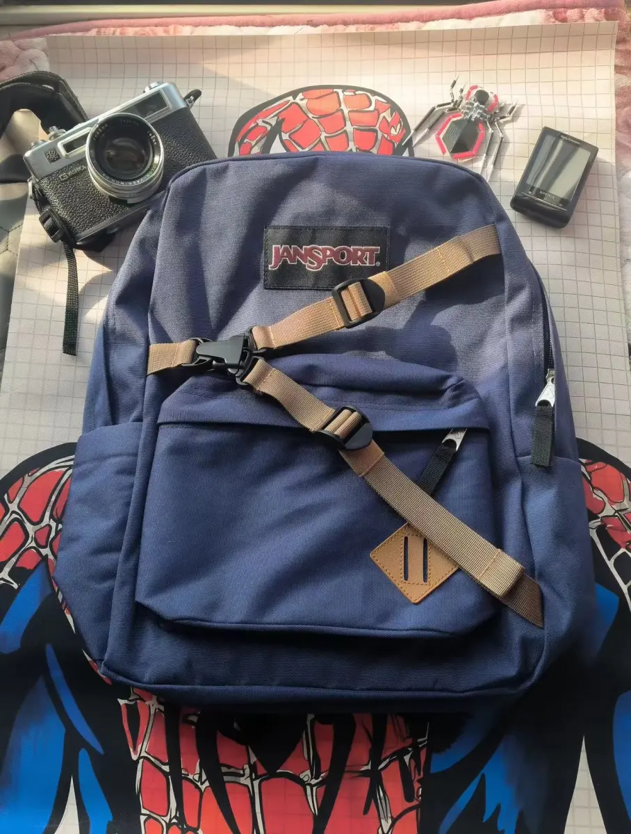 MaskOryx navy blue Peter Parker TASM1 replica backpack with tan adjustable straps and front storage pocket